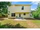 The home features a spacious backyard with a patio area and well-maintained lawn for outdoor enjoyment at 1777 Cutters Mill Way, Lithonia, GA 30058