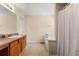 Bright bathroom features a bathtub, sink, and neutral wall paint at 1777 Cutters Mill Way, Lithonia, GA 30058