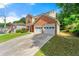 Charming two-story brick home with a two-car garage and inviting curb appeal at 1777 Cutters Mill Way, Lithonia, GA 30058