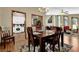 Inviting dining room with hardwood floors, with views of the living room and the kitchen at 3491 Birchwood Trl, Snellville, GA 30078