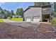Spacious two-car garage with long drive way and elevated deck at 3491 Birchwood Trl, Snellville, GA 30078