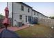 Fenced backyard featuring a grass yard, brick patio and trampoline at 375 Auburn Valley Way, Auburn, GA 30011