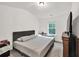 Bedroom with comfortable bedding and natural light at 375 Auburn Valley Way, Auburn, GA 30011