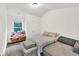 Cozy bedroom with natural light at 375 Auburn Valley Way, Auburn, GA 30011