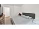 Bedroom with a gray bed set and comfortable gray throw pillows at 375 Auburn Valley Way, Auburn, GA 30011