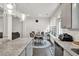 Bright dining area with stylish furnishings, a round table, and views from a window at 375 Auburn Valley Way, Auburn, GA 30011