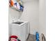 Laundry room featuring a white washer and dryer at 375 Auburn Valley Way, Auburn, GA 30011