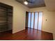 This bedroom has wood floors, closet, and modern design elements at 620 Glen Iris Ne Dr # 321, Atlanta, GA 30308