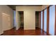 Bedroom features wood floors, access to closet space, and modern design elements at 620 Glen Iris Ne Dr # 321, Atlanta, GA 30308