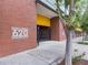 An exterior shot of building with brick facade, showcasing the signage and entrance at 620 Glen Iris Ne Dr # 321, Atlanta, GA 30308