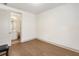 This bedroom features hardwood floors and an ensuite bathroom for added convenience at 92 Rogers Ne St, Atlanta, GA 30317