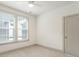 Bright bedroom with neutral walls, carpet flooring, and large windows that bring in natural light at 92 Rogers Ne St, Atlanta, GA 30317