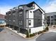 Beautiful townhome exterior featuring modern black and white design with private garages at 92 Rogers Ne St, Atlanta, GA 30317