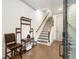 Inviting foyer featuring hardwood floors, staircase, and modern decor providing a warm welcome at 92 Rogers Ne St, Atlanta, GA 30317