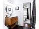 Charming bathroom with a wooden vanity, hexagon tile, and a view of the bedroom at 2047 Seavey Dr, Decatur, GA 30032