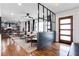 Bright open-concept living room with hardwood floors and stylish modern design features at 2047 Seavey Dr, Decatur, GA 30032