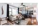 Cozy living room with large windows, modern furnishings, and stylish accents at 2047 Seavey Dr, Decatur, GA 30032