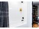 Modern shower with white subway tile and black hardware at 2047 Seavey Dr, Decatur, GA 30032