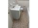 Small bathroom with single sink vanity and neutral tile flooring at 2095 Mulkey Sw Rd, Marietta, GA 30008