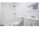 Clean, modern bathroom with all-white fixtures and a tiled shower at 3831 Flakes Mill Rd, Decatur, GA 30034