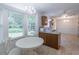 Bright kitchen with granite counters, tiled floors, and sunny breakfast nook with backyard view at 4307 Windward Ln, Norcross, GA 30093