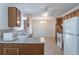 This is a kitchen with wooden cabinets, granite countertops, and stainless steel appliances at 4307 Windward Ln, Norcross, GA 30093