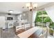 Bright eat-in kitchen with stainless appliances and access to a patio area at 7108 Hummingbird Ln, Winston, GA 30187