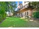 Manicured backyard with lush green lawn and tiered deck, perfect for outdoor activities and entertaining at 8430 Merion Drive, Duluth, GA 30097