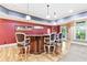 Finished basement features a custom bar area and hardwood floors at 8430 Merion Drive, Duluth, GA 30097