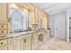 Large bathroom with dual vanities and separate tub and shower at 8430 Merion Drive, Duluth, GA 30097