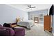 Bright bedroom with carpeting, ceiling fan, and natural light at 8430 Merion Drive, Duluth, GA 30097