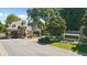 Elegant stone entrance of the St Marlo Country Club, showcasing beautifully landscaped grounds and architectural details at 8430 Merion Drive, Duluth, GA 30097