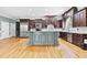 Well-appointed kitchen with kitchen island and stainless steel appliances at 8430 Merion Drive, Duluth, GA 30097