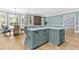 Kitchen island with granite countertop and custom cabinets at 8430 Merion Drive, Duluth, GA 30097