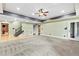 Spacious living room area with hardwood and carpet flooring at 8430 Merion Drive, Duluth, GA 30097