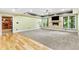 Spacious living room area with hardwood and carpet flooring, and fireplace at 8430 Merion Drive, Duluth, GA 30097