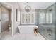 Modern bathroom with soaking tub, glass shower, and sleek fixtures at 1006 Kingsbridge Vw, Powder Springs, GA 30127