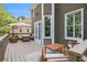Spacious outdoor deck with comfortable seating, offering a great space for relaxation and social gatherings at 1006 Kingsbridge Vw, Powder Springs, GA 30127