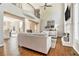Bright living room with fireplace and second story balcony at 1006 Kingsbridge Vw, Powder Springs, GA 30127