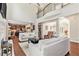 Open-concept living room seamlessly connected to dining and kitchen areas at 1006 Kingsbridge Vw, Powder Springs, GA 30127