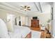 Spacious main bedroom featuring hardwood floors, tray ceiling, and large windows at 1006 Kingsbridge Vw, Powder Springs, GA 30127