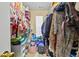 This walk-in closet provides ample storage space with organized shelving and hanging areas at 1414 Dolcetto Nw Trce # 14, Kennesaw, GA 30152