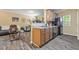 This eat-in kitchen features wood cabinets and modern appliances at 1414 Dolcetto Nw Trce # 14, Kennesaw, GA 30152