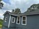 Detailed shot of the exterior siding showing window placements and home's structure at 2268 Newnan St, Atlanta, GA 30344