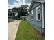 Side view of the home showcasing the well-kept lawn and exterior siding at 2268 Newnan St, Atlanta, GA 30344