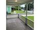 View from the porch highlighting the wooden flooring and decorative white lattice railing at 2268 Newnan St, Atlanta, GA 30344