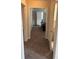 Hallway leading to a room with a sofa, offering a glimpse of comfortable living spaces at 2268 Newnan St, Atlanta, GA 30344