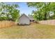 A spacious fenced backyard with a deck, perfect for outdoor entertaining and recreation at 764 Stokeswood Se Ave, Atlanta, GA 30316