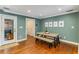 Cozy dining area with hardwood floors and a rustic wood table setting at 764 Stokeswood Se Ave, Atlanta, GA 30316