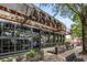 Argosy restaurant exterior showing its large windows, wooden accents, and sidewalk seating area at 764 Stokeswood Se Ave, Atlanta, GA 30316